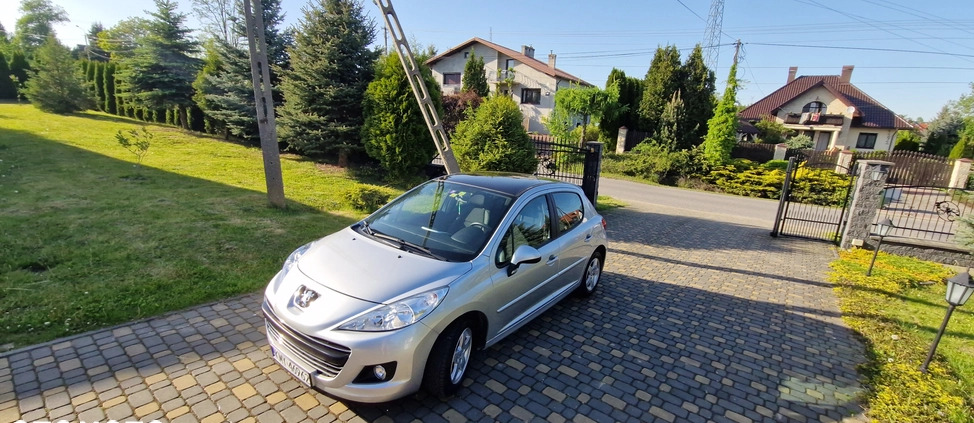 Peugeot 207 cena 16800 przebieg: 129107, rok produkcji 2010 z Bełchatów małe 407